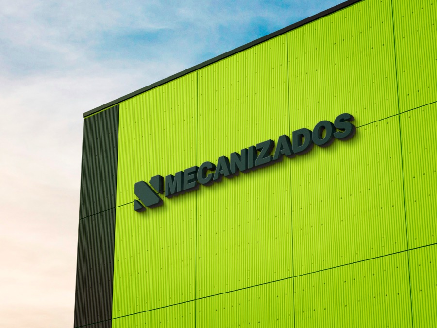 Aplicação da identidade Mecanizados em fachada industrial